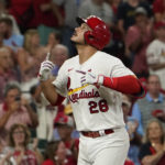 
              St. Louis Cardinals' Nolan Arenado celebrates after hitting a solo home run during the sixth inning of a baseball game against the Milwaukee Brewers Friday, Aug. 12, 2022, in St. Louis. (AP Photo/Jeff Roberson)
            