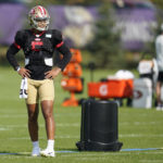 
              San Francisco 49ers quarterback Trey Lance takes part in drills during a joint practice with the Minnesota Vikings at NFL football training camp in Eagan, Minn., Thursday, Aug. 18, 2022. (AP Photo/Abbie Parr)
            