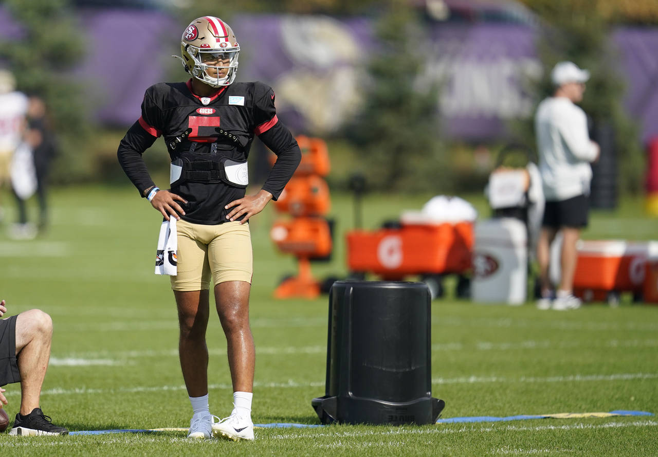 San Francisco 49ers quarterback Trey Lance takes part in drills during a joint practice with the Mi...