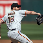 
              San Francisco Giants starting pitcher Carlos Rodón delivers a pitch against the Oakland Athletics during the first inning of a baseball game Saturday, Aug. 6, 2022, in Oakland, Calif. (AP Photo/D. Ross Cameron)
            