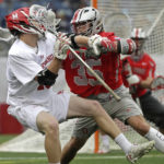 
              FILE - Ohio State's Logan Maccani (35) defends against Maryland's Jared Bernhardt, left, during the first half of the NCAA college Division 1 lacrosse championship final, Monday, May 29, 2017, in Foxborough, Mass.  Just two years after being honored as the nation’s top college lacrosse player, Bernhardt is trying to make it as an NFL receiver with the Atlanta Falcons. (AP Photo/Elise Amendola, File)
            