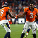 
              Denver Broncos wide receiver Seth Williams (19) celebrates his touchdown catch against the Dallas Cowboys with teammate Russell Wilson during the first half of an NFL preseason football game, Saturday, Aug. 13, 2022, in Denver. (AP Photo/Jack Dempsey)
            