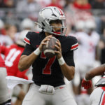 
              FILE - Ohio State quarterback C.J. Stroud plays in an NCAA college spring football game Saturday, April 16, 2022, in Columbus, Ohio. Stroud is a top contender for the 2022 Heisman Trophy. (AP Photo/Jay LaPrete, File)
            