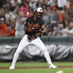 
              Baltimore Orioles' Jorge Mateo reacts after hitting a three-run home run against the Boston Red Sox in the second inning of a baseball game, Friday, Aug. 19, 2022, in Baltimore. Mateo missed stepping on first, and went back to touch the base. (AP Photo/Gail Burton)
            