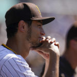 
              San Diego Padres starting pitcher Yu Darvish looks on in the dugout during the seventh inning of the first baseball game of a doubleheader against the Colorado Rockies, Tuesday, Aug. 2, 2022, in San Diego. (AP Photo/Gregory Bull)
            