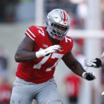 
              FILE - Ohio State offensive lineman Paris Johnson plays against Tulsa during an NCAA college football game Saturday, Sept. 18, 2021, in Columbus, Ohio. Johnson was named to The Associated Press preseason All-America team, Monday, Aug. 22, 2022. (AP Photo/Jay LaPrete, File)
            