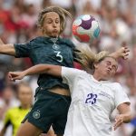 
              FILE - England's Alessia Russo, right, vies for the ball with Germany's Kathrin-Julia Hendrich during the Women's Euro 2022 final soccer match between England and Germany at Wembley stadium in London, Sunday, July 31, 2022. (AP Photo/Alessandra Tarantino, File)
            