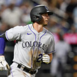 
              Colorado Rockies' Ryan McMahon runs the bases after hitting a home run during the sixth inning of a baseball game against the New York Mets, Thursday, Aug. 25, 2022, in New York. (AP Photo/Frank Franklin II)
            