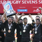 
              New Zealand's Kurt Baker and members of the team lift the trophy for winning the Los Angeles rugby sevens series final match between Fiji and New Zealand at Dignity Health Sports Park in Carson, Calif., Sunday, 28, Aug. 27, 2022. (AP Photo/Marcio Jose Sanchez)
            