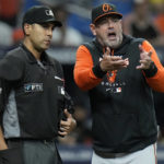 
              Baltimore Orioles manager Brandon Hyde, right, argues with home plate umpire Gabe Morales after Morales called Terrin Vavra out for running out of the baseline during the sixth inning of a baseball game against the Tampa Bay Rays Friday, Aug. 12, 2022, in St. Petersburg, Fla. (AP Photo/Chris O'Meara)
            