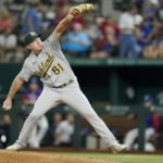 
              Oakland Athletics relief pitcher Zach Jackson throws to the Texas Rangers in the seventh inning of a baseball game, Wednesday, Aug. 17, 2022, in Arlington, Texas. (AP Photo/Tony Gutierrez)
            
