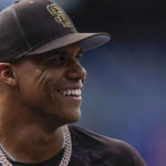 
              San Diego Padres right fielder Juan Soto smiles during batting practice before team's baseball game against the Colorado Rockies on Wednesday, Aug. 3, 2022, in San Diego. (AP Photo/Gregory Bull)
            