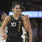 
              Las Vegas Aces guard Kelsey Plum (10) pumps her fist after scoring during the second half of a WNBA basketball game against the Seattle Storm, Sunday, Aug. 14, 2022, in Las Vegas. (AP Photo/Sam Morris)
            