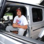 
              Ohio State quarterback C.J. Stroud sits in the drivers seat after he received a 2019 Mercedes G-Wagon G63 in Canton, Ohio on June 8, 2022. Stroud has a deal with Sarchione Auto Gallery that allows them to use the quarterback's name, image and likeness in its advertising. Glance around the parking lot of the Woody Hayes Athletic Center at The Ohio State University this fall and you might come across a $200,000 palace on wheels, the kind of luxury ride more likely to be found in the garages of movie stars, music moguls and titans of business than on a college campus. (The Repository/Scott Heckel via AP)
            