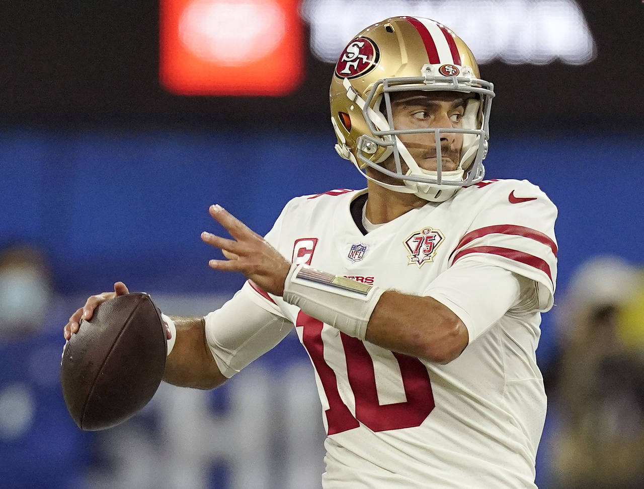 FILE - San Francisco 49ers' Jimmy Garoppolo throws during the second half of the NFC Championship N...