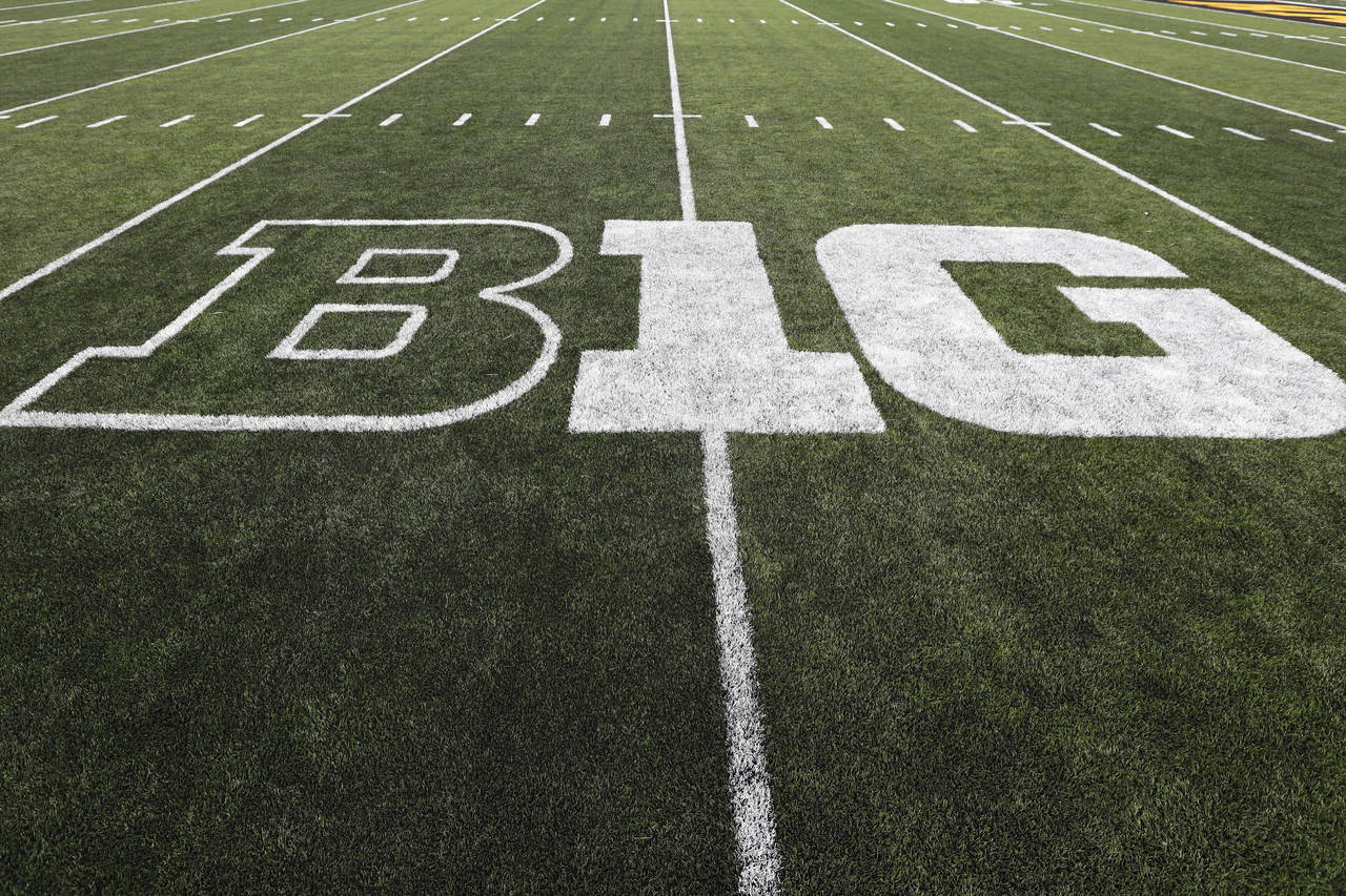 FILE - The Big Ten logo is displayed on the field before an NCAA college football game between Iowa...