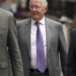 
              Former Manchester United manager Sir Alex Ferguson arrives at Manchester Crown Court where his former player Ryan Giggs is on trial accused of controlling and coercive behaviour against ex-girlfriend Kate Greville, in Manchester, England, Friday, Aug. 19, 2022. Giggs is also charged with assaulting Ms Greville and causing her actual bodily harm at his home in Worsley, Greater Manchester, on Nov. 1, 2020 and common assault against her younger sister, Emma, in the alleged same incident. (Peter Byrne/PA via AP)
            