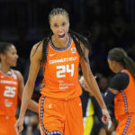 
              Connecticut Sun forward DeWanna Bonner (24) yells in celebration during the second half of Game 3 of a WNBA first-round playoff series basketball game against the Dallas Wings in Arlington, Texas, Wednesday, Aug. 24, 2022. The Sun won 73-58. (AP Photo/LM Otero)
            