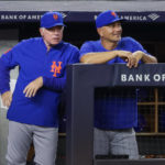 
              New York Mets manager Buck Showalter looks on with hitting coach Eric Chavez in the fourth inning of a baseball game against the New York Yankees, Monday, Aug. 22, 2022, in New York. (AP Photo/Corey Sipkin)
            