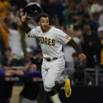 
              San Diego Padres' Trent Grisham celebrates after hitting a walk-off home run during the ninth inning of the second baseball game of a doubleheader against the Colorado Rockies, Tuesday, Aug. 2, 2022, in San Diego. (AP Photo/Gregory Bull)
            