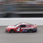 
              Kevin Harvick drives during the NASCAR Cup Series auto race at the Michigan International Speedway in Brooklyn, Mich., Sunday, Aug. 7, 2022. (AP Photo/Paul Sancya)
            