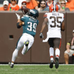 
              Philadelphia Eagles wide receiver Devon Allen (39) hauls in a pass for a touchdown past Cleveland Browns cornerback Lavert Hill (35) during the second half of an NFL preseason football game in Cleveland, Sunday, Aug. 21, 2022. (AP Photo/Ron Schwane)
            
