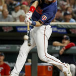 
              Minnesota Twins' Jake Cave hits a solo home run against the Toronto Blue Jays during the ninth inning of a baseball game Thursday, Aug. 4, 2022, in Minneapolis. The Blue Jays won 9-3. (AP Photo/Bruce Kluckhohn)
            
