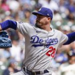 
              Los Angeles Dodgers starting pitcher Andrew Heaney throws during the first inning of a baseball game against the Milwaukee Brewers Thursday, Aug. 18, 2022, in Milwaukee. (AP Photo/Morry Gash)
            