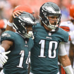 
              Philadelphia Eagles quarterback Gardner Minshew (10) congratulates running back Kenneth Gainwell (14) after Gainwell ran in a touchdown against the Cleveland Browns during the first half of an NFL preseason football game in Cleveland, Sunday, Aug. 21, 2022. (AP Photo/David Richard)
            