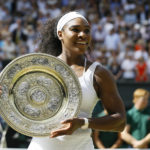 
              FILE - Serena Williams holds up the trophy after winning the women's singles final against Garbine Muguruza of Spain, at the All England Lawn Tennis Championships in Wimbledon, London, Saturday, July 11, 2015. Williams won 6-4, 6-4. Serena Williams says she is ready to step away from tennis after winning 23 Grand Slam titles, turning her focus to having another child and her business interests. “I’m turning 41 this month, and something’s got to give,” Williams wrote in an essay released Tuesday, Aug. 9, 2022, by Vogue magazine. (AP Photo/Kirsty Wigglesworth, File)
            