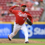 
              Cincinnati Reds' Alexis Diaz throws during the ninth inning of a baseball game against the Chicago Cubs in Cincinnati, Sunday, Aug. 14, 2022. (AP Photo/Aaron Doster)
            