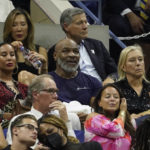 
              Mike Tyson, center, watches Serena Williams, of the United States, and Danka Kovinic, of Montenegro, during the first round of the US Open tennis championships, Monday, Aug. 29, 2022, in New York. (AP Photo/John Minchillo)
            