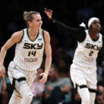 
              Chicago Sky guards Allie Quigley (14) and Kahleah Copper (2) react after a three point shot against the New York Liberty during the second half of a WNBA basketball playoff game Tuesday, Aug. 23, 2022, in New York. The Chicago Sky won 90-72. (AP Photo/Noah K. Murray)
            