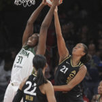 
              Seattle Storm center  Tina Charles (31) and Las Vegas Aces center Iliana Rupert (21) fight for a rebound during the first half of a WNBA basketball game Sunday, Aug. 14, 2022, in Las Vegas. (AP Photo/Sam Morris)
            
