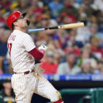 
              Philadelphia Phillies' Rhys Hoskins tosses his bat after hitting a fly out against Pittsburgh Pirates pitcher Zach Thompson during the fourth inning of a baseball game, Friday, Aug. 26, 2022, in Philadelphia. (AP Photo/Matt Slocum)
            