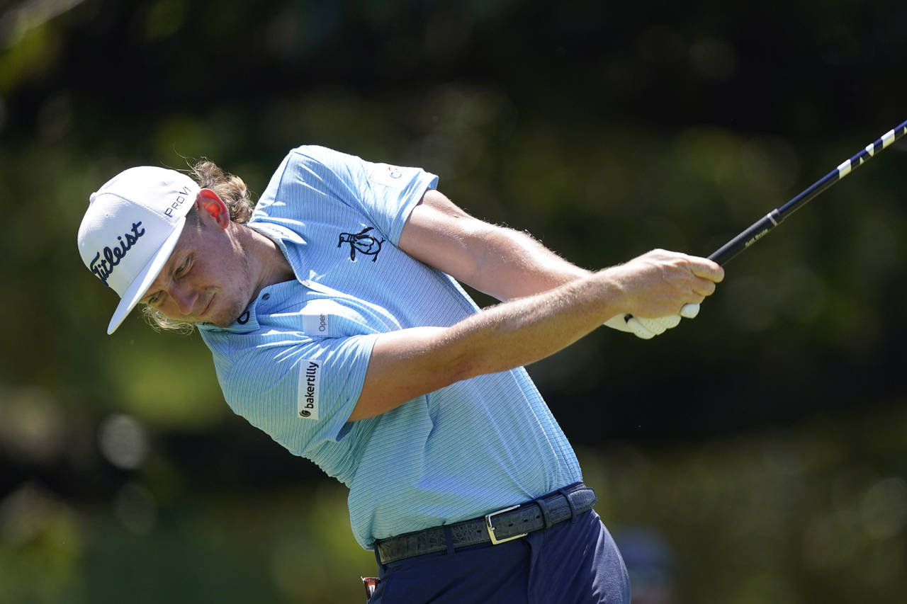 Cameron Smith, of Australia, hits off the sixth tee during the third round of the St. Jude Champion...