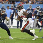 
              Tampa Bay Buccaneers running back Rachaad White (29) carries the ball against the Tennessee Titans in the first half of a preseason NFL football game Saturday, Aug. 20, 2022, in Nashville, Tenn. (AP Photo/Mark Zaleski)
            