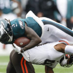 
              Philadelphia Eagles wide receiver Zach Pascal (3) is tackled by Cleveland Browns running back John Kelly Jr. (41) after making a catch during the first half of an NFL preseason football game in Cleveland, Sunday, Aug. 21, 2022. (AP Photo/Ron Schwane)
            