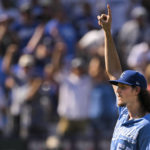 
              Kansas City Royals relief pitcher Scott Barlow celebrates after defeating the Los Angeles Dodgers in a baseball game, Sunday, Aug. 14, 2022, in Kansas City, Mo. (AP Photo/Reed Hoffmann)
            