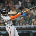 
              San Francisco Giants' Evan Longoria hits a two-run home run against the Detroit Tigers in the sixth inning of a baseball game in Detroit, Tuesday, Aug. 23, 2022. (AP Photo/Paul Sancya)
            