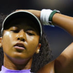 
              Naomi Osaka, of Japan, reacts after losing a point to Danielle Collins, of the United States, during the first round of the US Open tennis championships, Tuesday, Aug. 30, 2022, in New York. (AP Photo/Frank Franklin II)
            