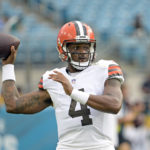 
              Cleveland Browns quarterback Deshaun Watson (4) warm up before an NFL preseason football game against the Jacksonville Jaguars, Friday, Aug. 12, 2022, in Jacksonville, Fla. (AP Photo/Phelan M. Ebenhack)
            