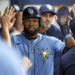 
              Tampa Bay Rays' Manuel Margot celebrates scoring against the Los Angeles Angels during the third inning of a baseball game Tuesday, Aug. 23, 2022, in St. Petersburg, Fla. (AP Photo/Mike Carlson)
            