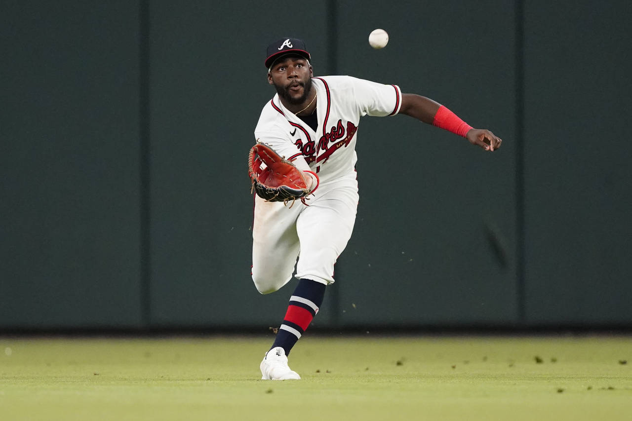 Atlanta Braves center fielder Michael Harris II (23) makes a running catch on a fly ball from New Y...