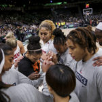 
              The Washington Mystics huddle before Game 1 of the team's WNBA basketball first-round playoff series against the Seattle Storm on Thursday, Aug. 18, 2022, in Seattle. (AP Photo/Lindsey Wasson)
            