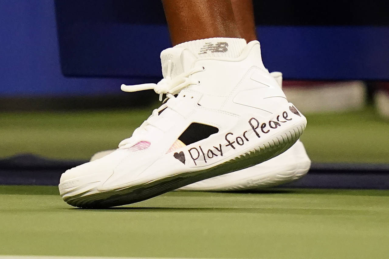 Coco Gauff walks on the court during a "The Tennis Plays for Peace" exhibition match to raise aware...
