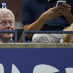 
              Former President Bill Clinton, left, and Ruth Westheimer watch play between Serena Williams, of the United States, and Danka Kovinic, of Montenegro, during the first round of the US Open tennis championships, Monday, Aug. 29, 2022, in New York. (AP Photo/Charles Krupa)
            