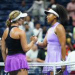 
              Danielle Collins, left, of the United States, shakes hands with Naomi Osaka, of Japan, during the first round of the US Open tennis championships, Wednesday, Aug. 31, 2022, in New York. (AP Photo/Frank Franklin II)
            
