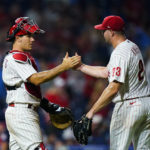 
              Philadelphia Phillies catcher J.T. Realmuto and relief pitcher Corey Knebel celebrate after the team's 11-5 win in a baseball game against the Washington Nationals, Saturday, Aug. 6, 2022, in Philadelphia. (AP Photo/Matt Rourke)
            