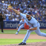 
              Toronto Blue Jays relief pitcher Anthony Bass throws to a Cleveland Guardians batter during the seventh inning of a baseball game in Toronto on Saturday, Aug. 13, 2022. (Jon Blacker/The Canadian Press via AP)
            